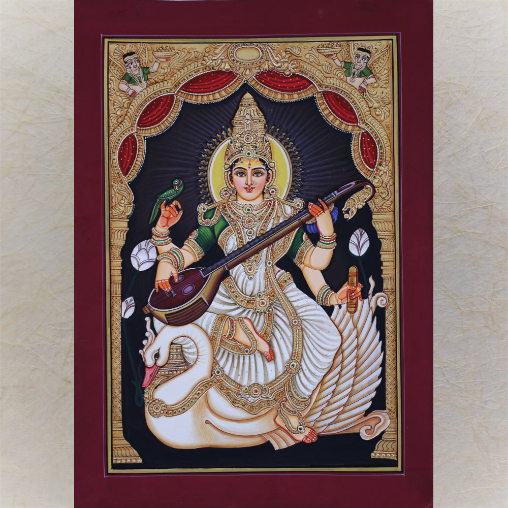 Saraswati : Goddess Of Learning On Swan Hancrafted Tanjore Style Gold Painting.Set In Beautiful Chettinad Style Frame